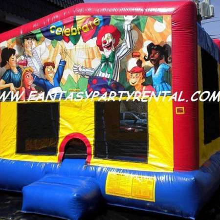 Celebrate primary colors bounce house with basketball hoop.