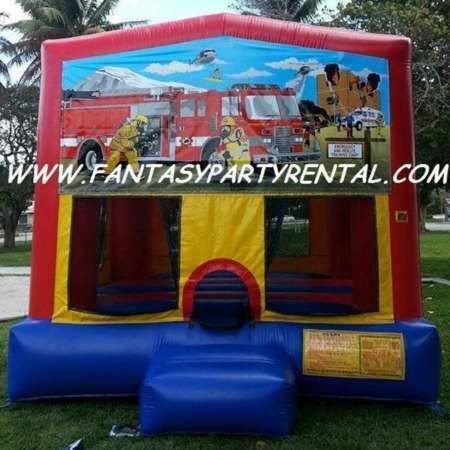 Fireman primary colors bounce house with basketball hoop.