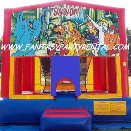 Scooby Doo primary colors bounce house with basketball hoop.