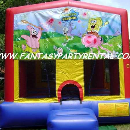 Sponge Bob primary colors bounce house with basketball hoop.