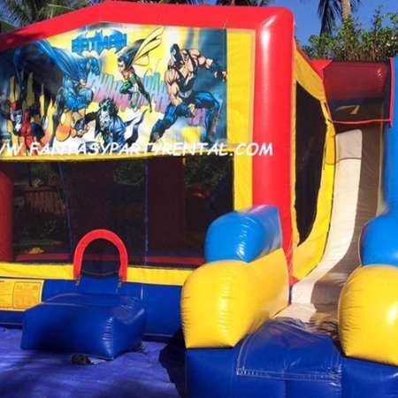 Batman Combo 7 in 1 bounce house. Bounce, pop up and side obstacles, 2 basketball hoops, climb, dry slide.