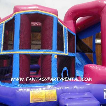 Pink and purple Combo 5 in 1 bounce house. Bounce, obstacles, basketball hoop, climb, dry slide.