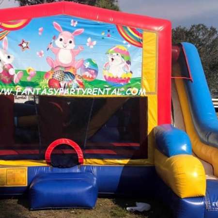 Easter Combo 7 in 1 bounce house. Bounce, pop up and side obstacles, 2 basketball hoops, climb, dry slide.