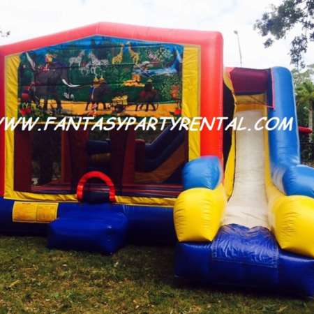 Jungle Combo 7 in 1 bounce house. Bounce, pop up and side obstacles, 2 basketball hoops, climb, dry slide.