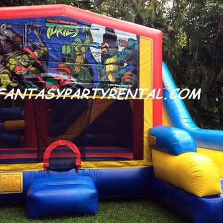 Ninja Turtle Combo 7 in 1 bounce house. Bounce, pop up and side obstacles, 2 basketball hoops, climb, dry slide.