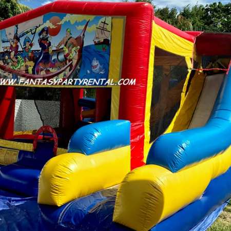 Pirate Combo 7 in 1 bounce house. Bounce, pop up and side obstacles, 2 basketball hoops, climb, dry slide.