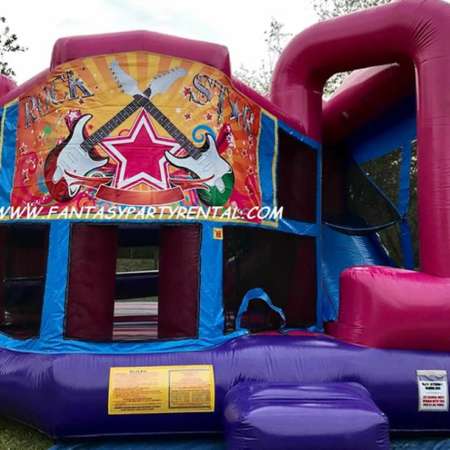 Rock Star pink and purple Combo 5 in 1 bounce house. Bounce, obstacles, basketball hoop, climb, dry slide.