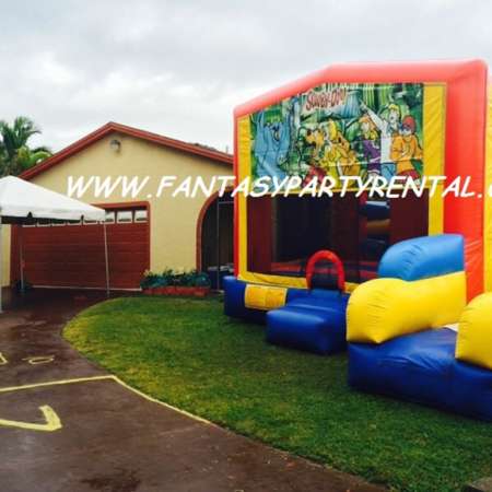Scooby Doo Combo 7 in 1 bounce house. Bounce, pop up and side obstacles, 2 basketball hoops, climb, dry slide.